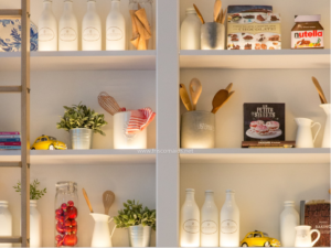 Clean White Pantry With Containers and Kitchen Supplies